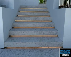 Stone staircase with wooden steps.