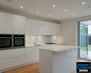 Modern kitchen with ample lighting and open space.